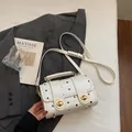 Elegant vintage white crossbody bag with black polka dots and gold turn-lock buckles - No Pendant / Off White