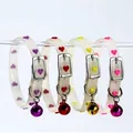 Pack of four fluorescent silicone pet collars featuring colorful heart prints and bells - Heart Pattern