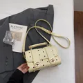 Elegant cream polka dot crossbody bag with dual metal turn-lock closures and top handle - No Pendant / Yellow