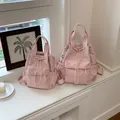 Dos mochilas rosas con cordón en tallas pequeña y grande para viajar con estilo - L / Rosa Claro