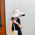 Beige fashionable wide brim sun hat featuring butterfly print and UV black vinyl lining - 55-58cm / Off White