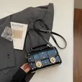Vintage black polka dot crossbody bag with gold twist locks and adjustable strap - No Pendant / Black