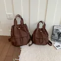 Mochila minimalista de nailon marrón con cordón en dos tamaños para desplazamientos - L / Café