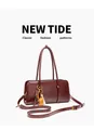 Detailed view of maroon retro crossbody handbag with decorative charms - 29CM*9CM*15CM / Dark Wine Red
