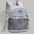 Sac à dos mode léger bleu clair et gris avec poche frontale en filet et cordon de serrage - Bleu Gris Blanc Brume