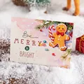 Festive Christmas greeting card featuring a gingerbread man and Merry & Bright message - Gingerbread Man Style / 11.5x8.5cm
