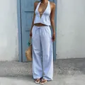 Blue and white striped halter crop top and matching wide-leg trousers vacation set. - S / Top And Bottom / Blue
