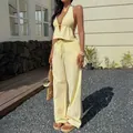 Yellow striped women's resort two-piece set with halter top and wide leg pants - S / Top And Bottom / Yellow