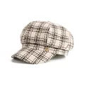 Detail view of the vintage plaid pattern and golden heart button on the newsboy hat. - 55-58cm / Beige