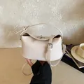 Cream textured leather bucket bag with silver turn-lock closure and shoulder strap - Style Without Pendant / Off White