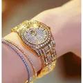 Luxury gold women's watch fully iced out with sparkling diamonds shown on a wrist - Iced Out Starry Sky (FA1643) / Luxury Gold