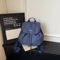 Small blue grid casual backpack with minimalist aesthetic for women daily commute - L / Blue