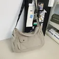 Minimalist beige canvas messenger bag with large capacity and durable adjustable strap - Light Gray