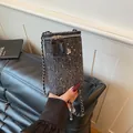 Chic tweed crossbody phone bag with chain strap and silver flower charm in black color - Tweed Style / Black