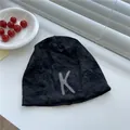 Stylish thin dark grey slouchy beanie for women featuring a large letter K patch - 56-59cm / Black