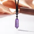 Elegante Halskette mit sechseckigem violettem Amethyst-Kristall und schwarzer Kordel. - Amethyst