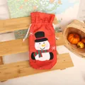 Festive red Christmas wine bottle cover with a cute snowman design for holiday table decor - Snowman