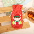 Festive red burlap Christmas wine bottle cover featuring a cute cartoon elf character - Elf