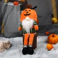 Plush Halloween gnome doll featuring orange pumpkin face hat and long dangling legs - Pumpkin Pattern