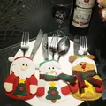 Set of 3 Christmas cutlery holders with Santa, Snowman, and Reindeer designs for table decor. - Santa Claus, Snowman, Reindeer / Set of 3