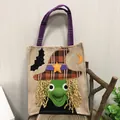 Festive Halloween burlap gift bag featuring a cute 3D green witch cartoon face design - Witch
