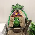 Sacchetto regalo Halloween con strega verde e cappello a quadri arancione - Strega