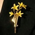 Creative gold vase-shaped brooch with yellow blossoms on black textured suit fabric - Spiral Hammered Art Brooch (7736)