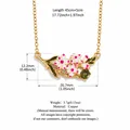 Vintage floral pendant necklace with green gemstone and white enamel flowers - August