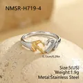 Detail of two-tone stainless steel heart hands ring with size and weight specs. - Double Hand Heart (NMSR-H719-4)