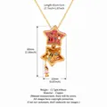 Gold plated star locket necklace featuring miniature dollhouse scene with small girl charm - Dressing Room Scene / Pink Star