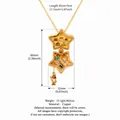 Gold-plated copper star locket necklace featuring a miniature little girl baking scene - Bakery Scene / Yellow Star