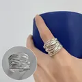 Minimalist silver intertwined wire ring in a multi-layered wrap style with open design. - Open Adjustable / Silver (JZ6401-1)