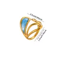 Detailed view of an 18K gold plated stainless steel ring with blue enamel drip oil - Flowing Line Style (JZ9847G)