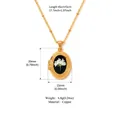 Vintage gold oval locket necklace with white dried flowers inside black background - Gold Frame Flower Cluster