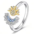 Elegante anello aperto sole e luna con pavé di pietre blu e trasparenti brillanti. - Anello Bicolore Sole Luna