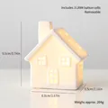 Petite maison lumineuse en céramique blanche de Noël avec piles LR44 incluses - Style Maison au Toit de Tuiles (204g)