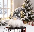Handmade Christmas gnome with grey snowflake knit hat sitting on a vintage red sled detail - Short Leg with LED / Gray