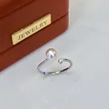 Elegant adjustable silver ring with natural freshwater pearl and sparkling gemstone detail - Adjustable Open / Single Stone Minimalist / Orange Pink