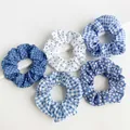 Assorted blue and white patterned scrunchies including polka dots and floral prints. - Five-Piece Set / Sky Blue