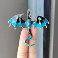 Detailed enamel dragon brooch with blue wings and sparkling rhinestones for women. - Blue