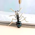 Elegant teal enamel ant brooch pin with black rhinestones and antique silver finish - Ink Blue
