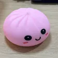 Cute pink slow-rebound squishy bun toy with a cartoon face for stress relief and play - Smiley Face / OPP Bag / Pink