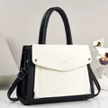 Detailed view of square contrast color PU leather handbag for women with chic texture - Contrast Color Square Style / White