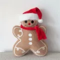 Adorable gingerbread man plush pillow with red Santa hat and scarf for Christmas decor - Gingerbread Man With Hat / 45cm / Brown