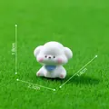 Miniature cute white puppy figurine decoration with dimensions shown on green grass - 1.8x2.1x1.4cm / Bichon Frise