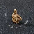 Miniature resin skull ornament with 1.8cm height dimension measurement details - Leaning Skeleton