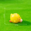 Miniature yellow chick figurine for gardening, measures 2.7cm long and 2.1cm high - Picking Eggs