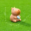 Miniature Capybara figurine holding a fish for micro landscape garden DIY decoration - 2.3x1.7x1.7cm / Holding Fish Capybara