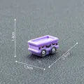Vagón de tren mini morado de Halloween con ruedas de calavera y medidas indicadas. - 2.5x1.5x1.4cm
