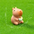 Miniature cute capybara figurine holding matcha cup, size 2.4cm for garden DIY decor. - 2.4x1.9x1.7cm / Tea Drinking Capybara